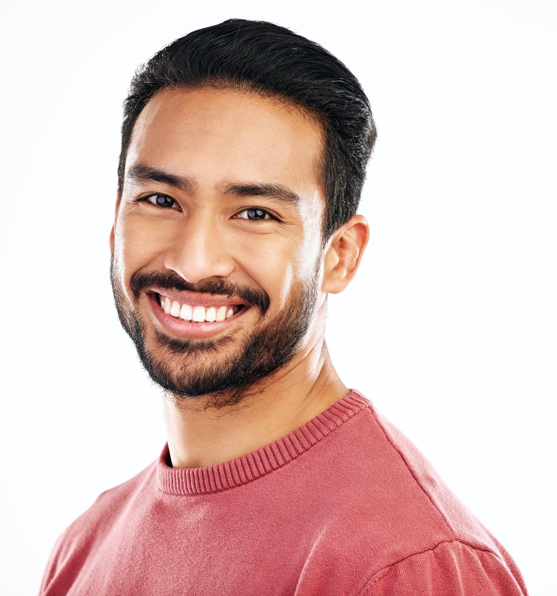 Happy, headshot and portrait of an Asian man with a smile isolated on a white background in a studi